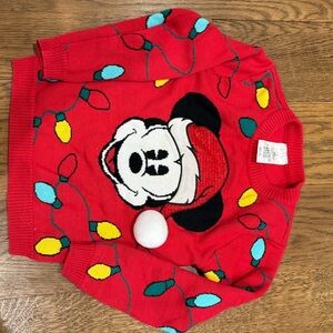 Red Holiday Sweater with Cartoon Design